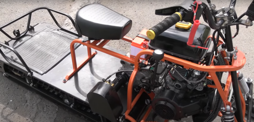 Изображение для Мотобуксировщик компактный Ижтехмаш  ЛИДЕР-СИГМА-4 (двигатель Динго180 , электро и кикстартер, реверс, фара, гусеница композит буксировщик МИНИ 500*2424 мм, чехол, чека)