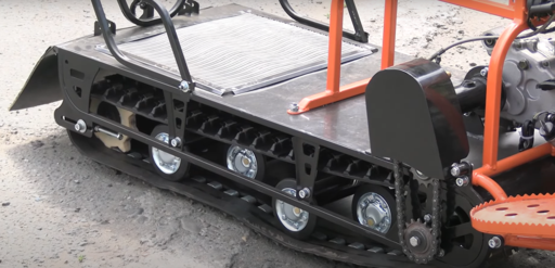 Изображение для Мотобуксировщик компактный Ижтехмаш  ЛИДЕР-СИГМА-4 (двигатель Динго180 , электро и кикстартер, реверс, фара, гусеница композит буксировщик МИНИ 500*2424 мм, чехол, чека)